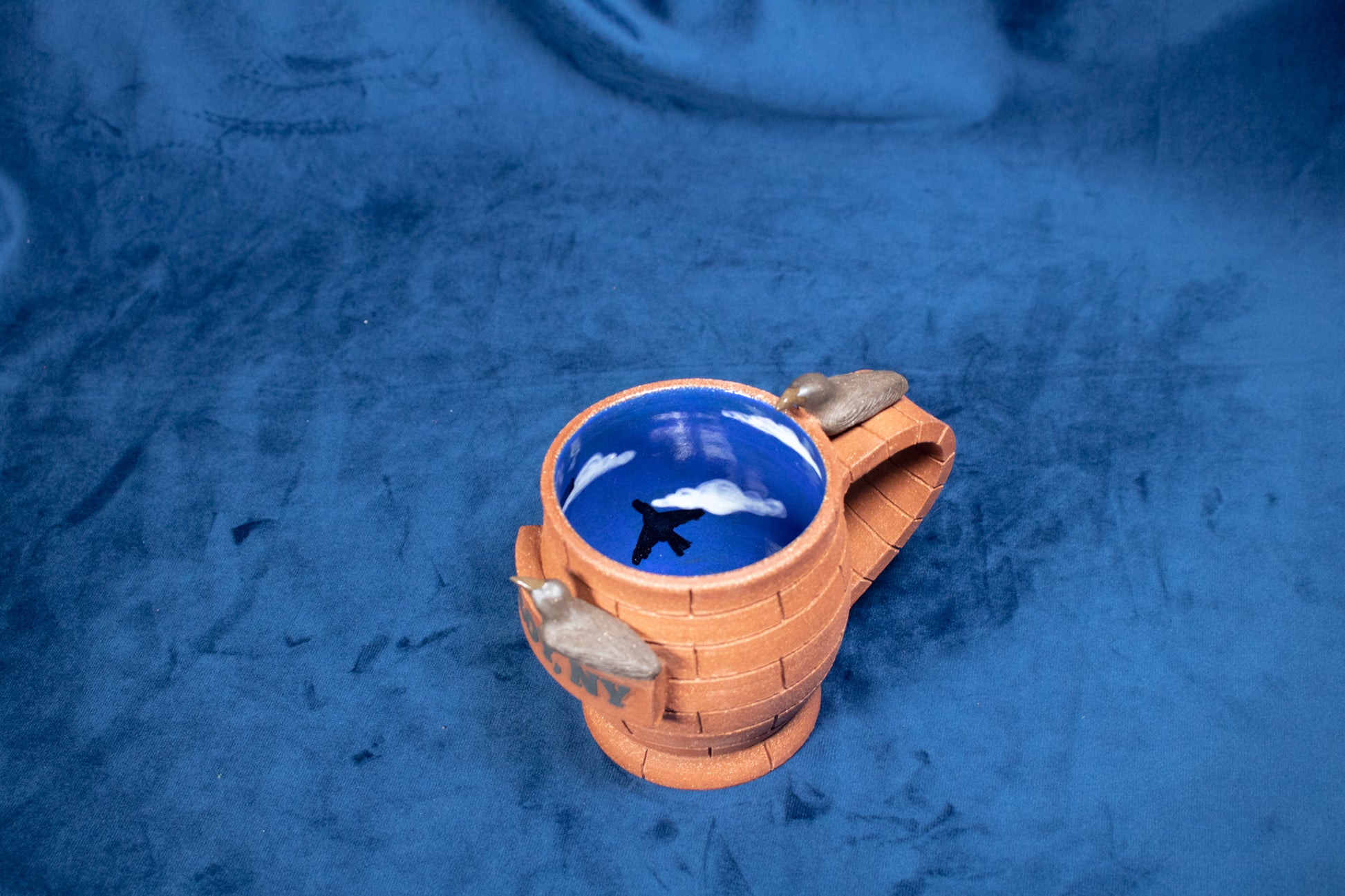 Small-batch ceramic mugs perfect for morning coffee or tea. Handmade in Troy, New York pottery studio. An homage to the crows and brick buildings of Troy NY. Give as a gift or keep for yourself, limited edition collectable mug, comes with certificate of authenticity. 
